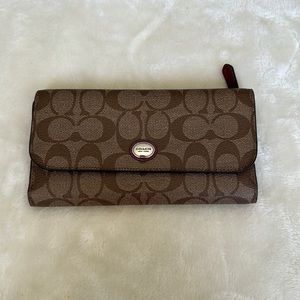 Coach Wallet with Berry accent color